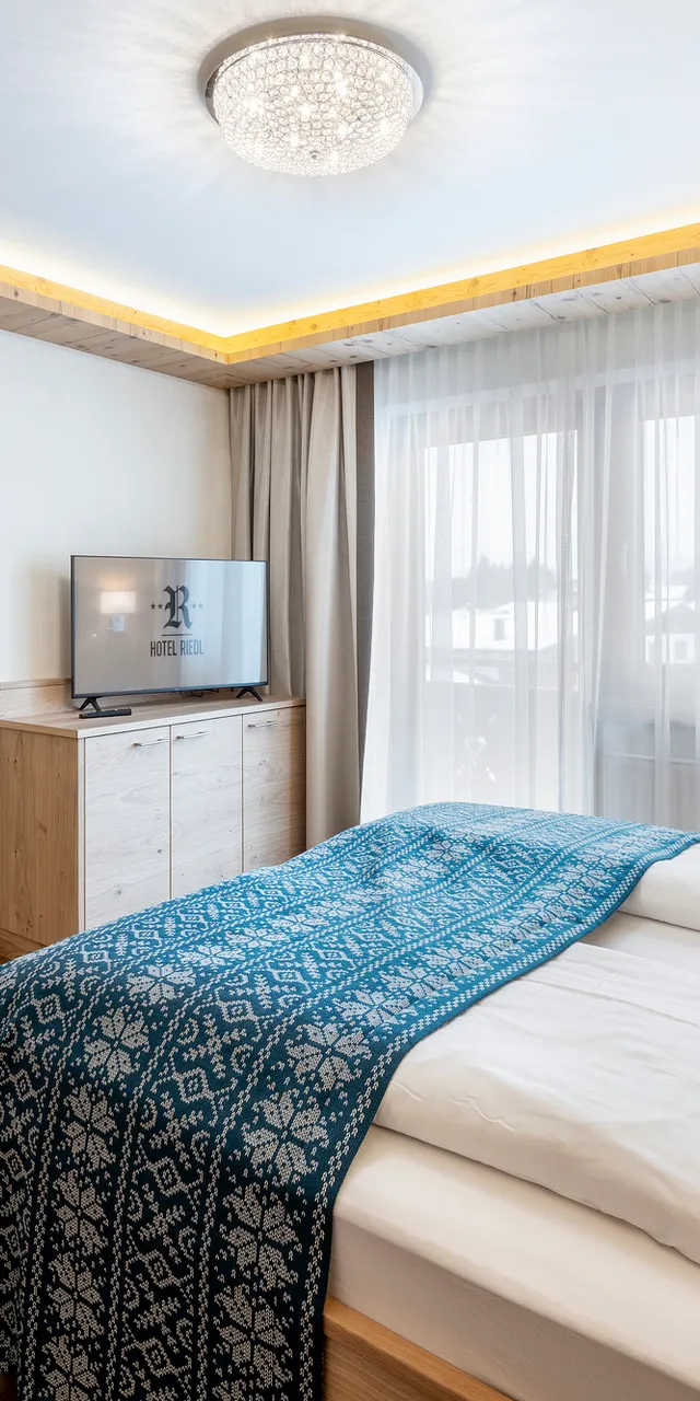 Suite_Heimatgefuehl_2_Hotel_Riedl_in_Koessen__C__Foto_Gretter__1_.jpg