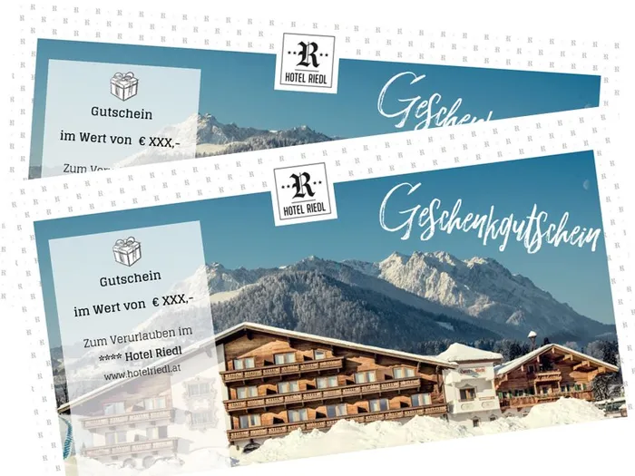 Hotel Riedl Geschenkgutscheine mit verschneiter Alpenkulisse und Hotelgebäude